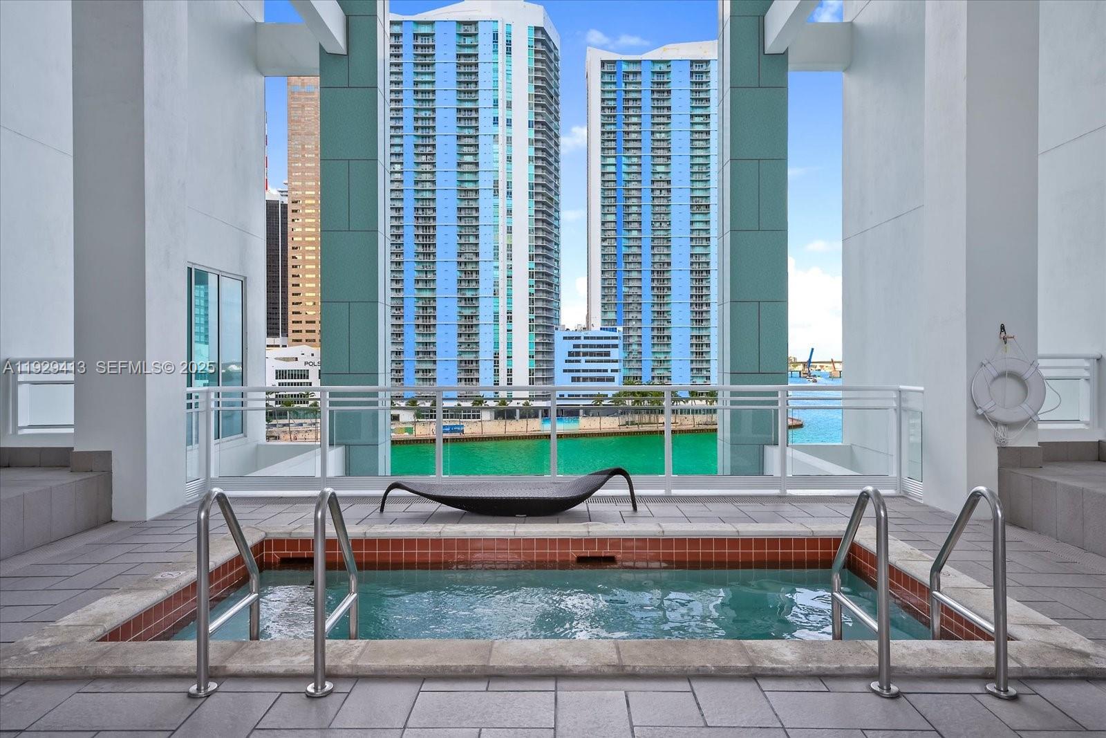 900 Brickell Key Boulevard, Unit 2605 Miami, FL 33131 - Photo 33 of 43 a house view with a sitting space