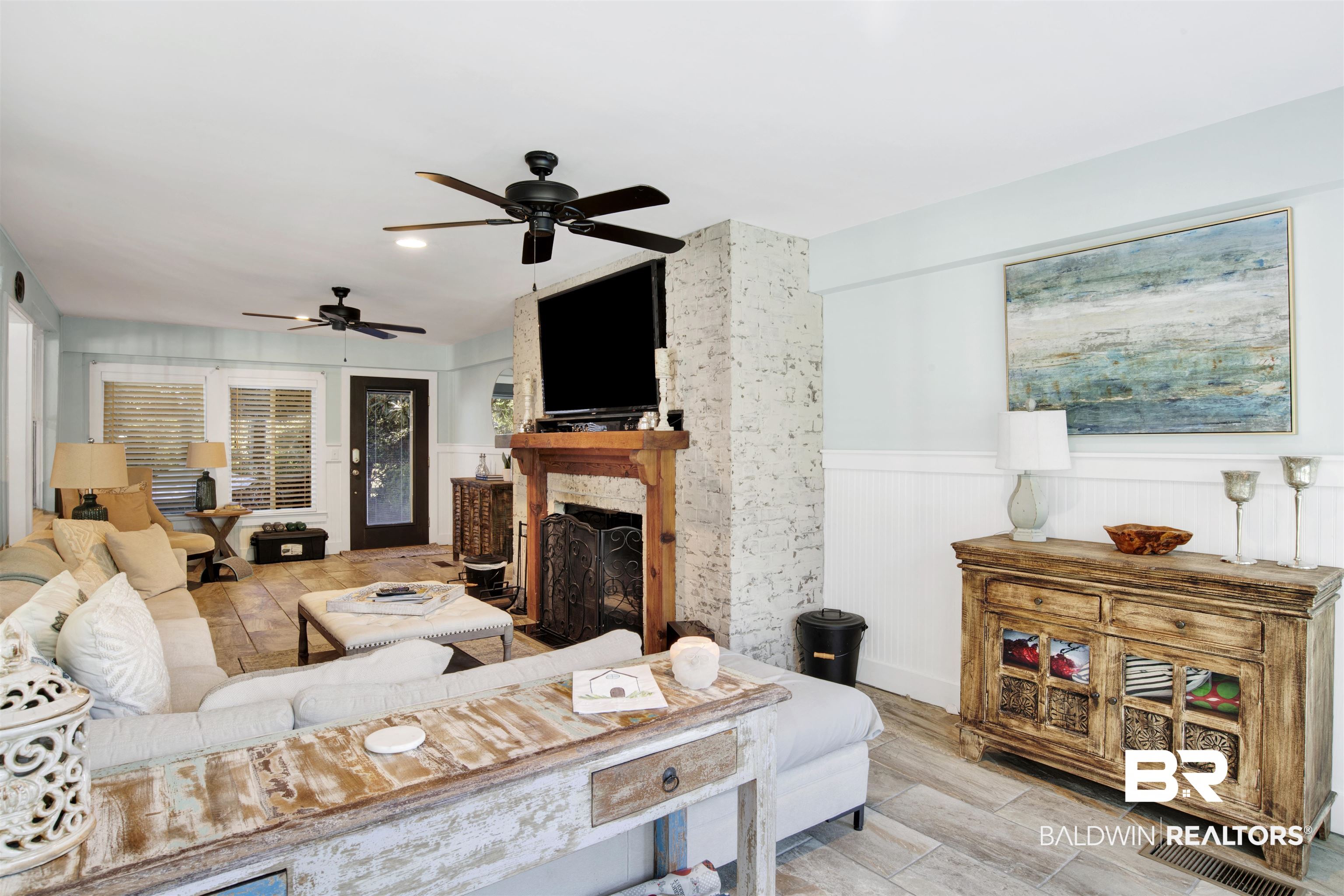 605 Van Avenue Daphne, AL 36526 - Photo 11 of 37 Living room featuring ceiling fan, a stone fireplace, and light wood-type flooring