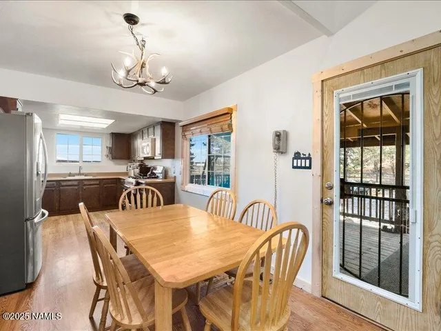 a workspace with furniture and a gate
