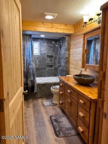 a view of a house with backyard porch and sitting area