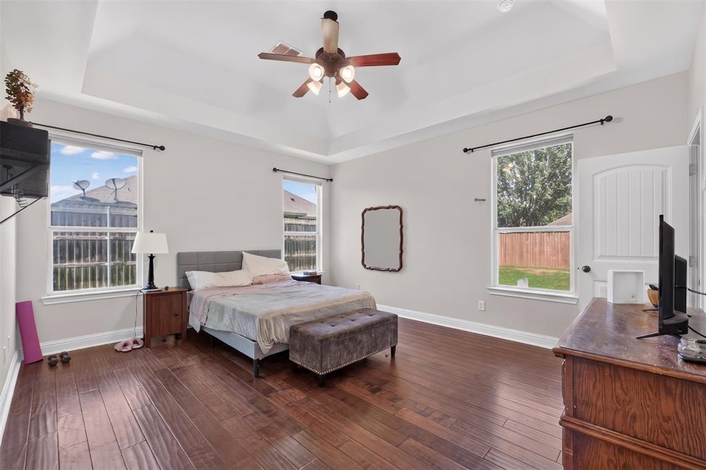 517 Austin Acre Road Sulphur Springs, TX 75482 - Photo 16 of 23 a bedroom with a bed and a window