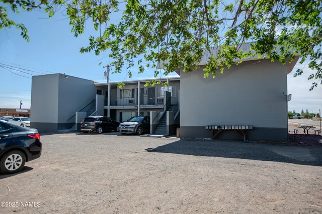 a view of a car in front of a house