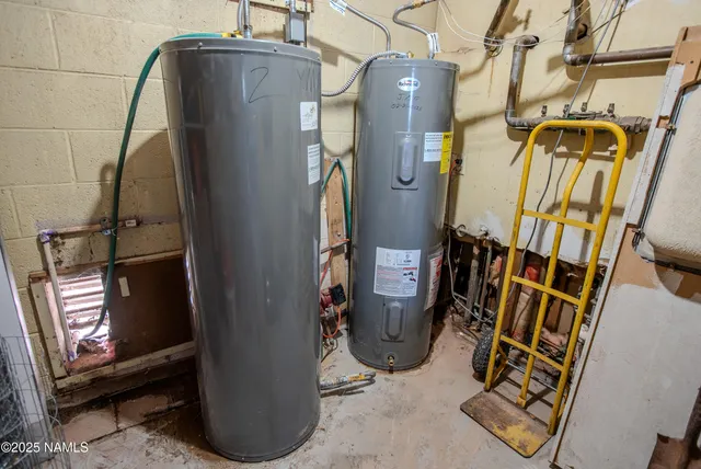 a kitchen with sink cabinets and wooden floor
