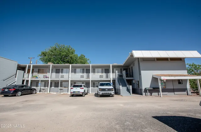 a car parked in front of a house