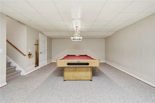 a view of an empty room with wooden roof