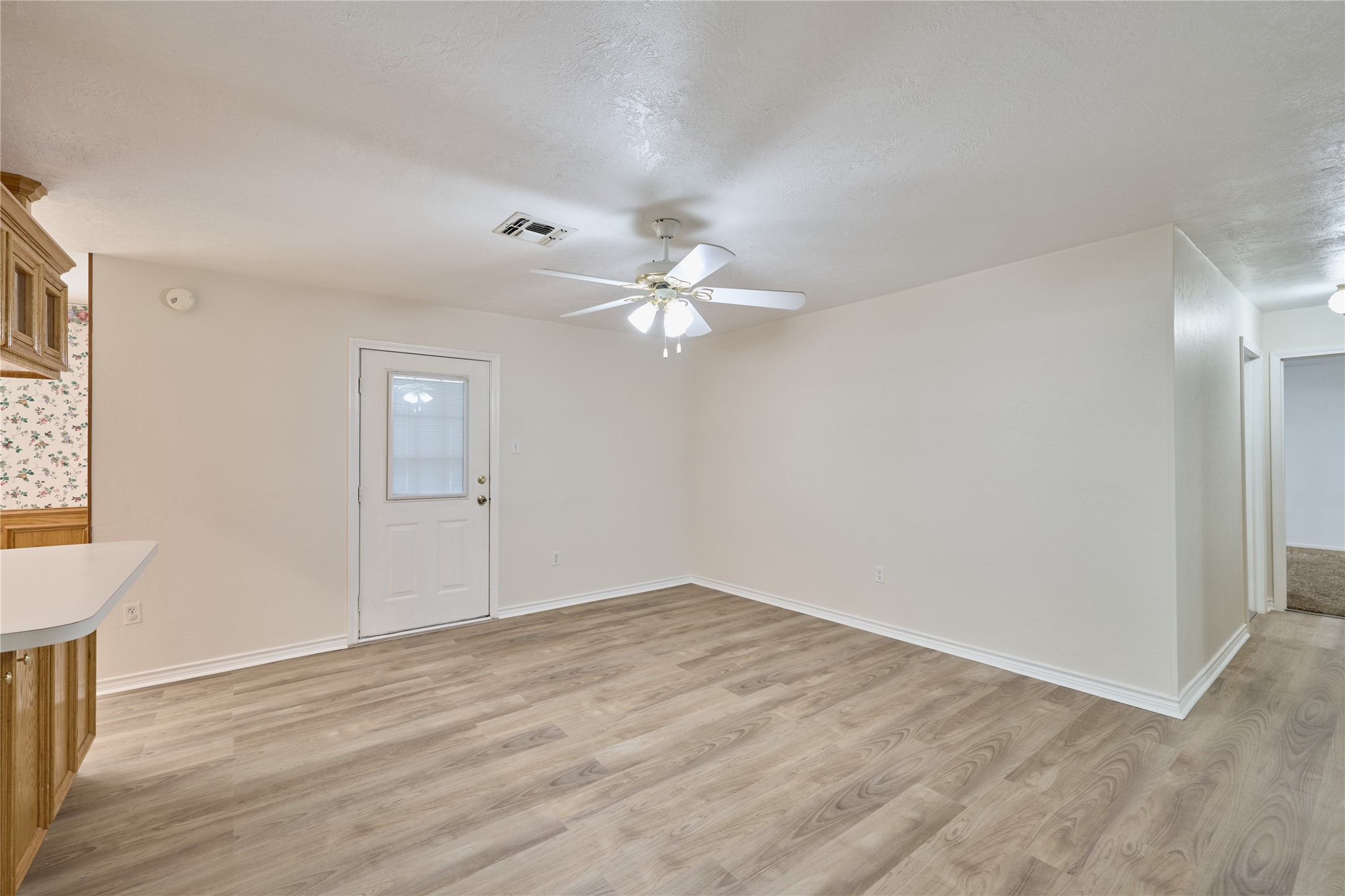 21807 Greengate Drive Spring, TX 77388 - Photo 31 of 44 a view of a room with wooden floor and ceiling fan