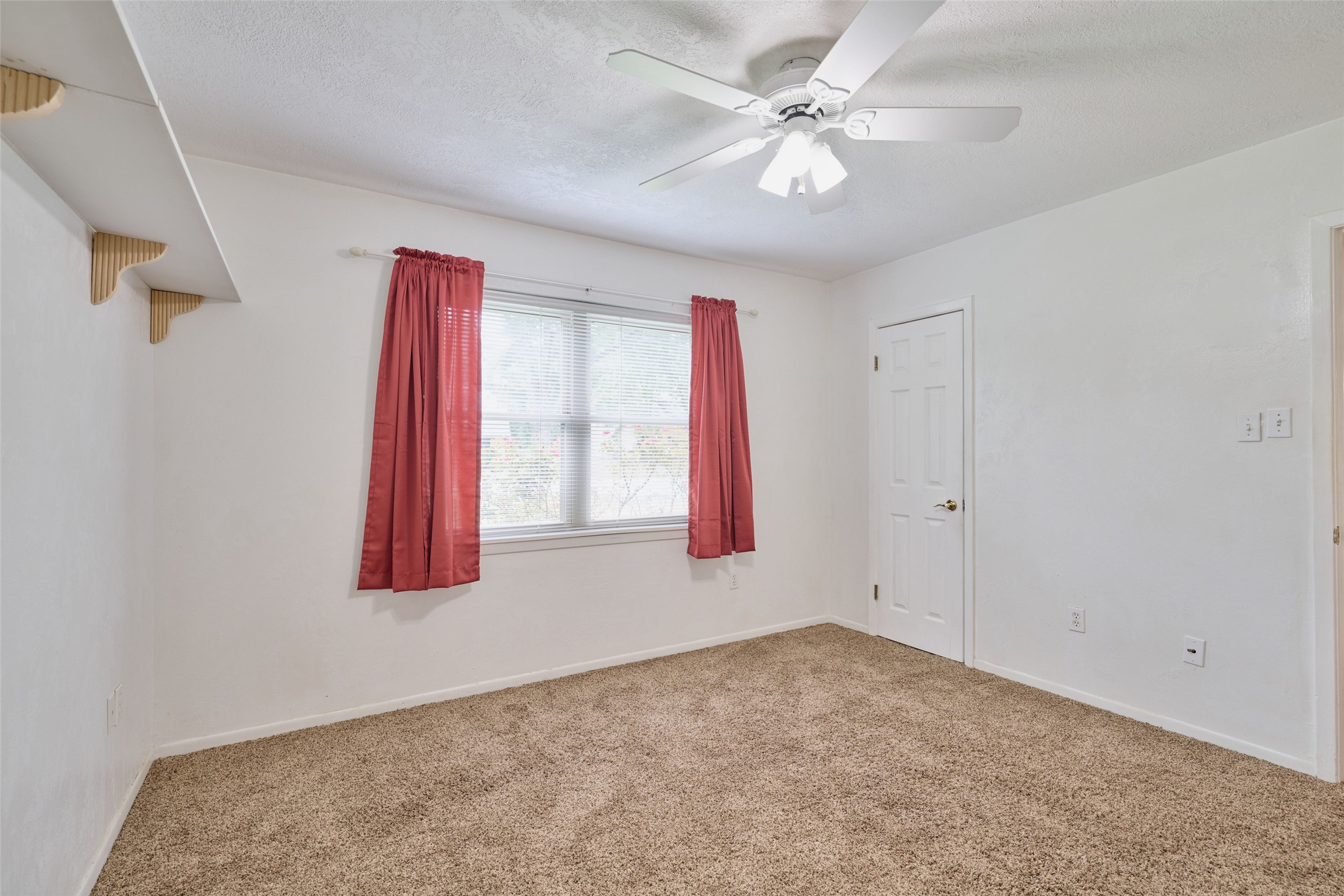 21807 Greengate Drive Spring, TX 77388 - Photo 10 of 44 a view of a room with window and ceiling fan
