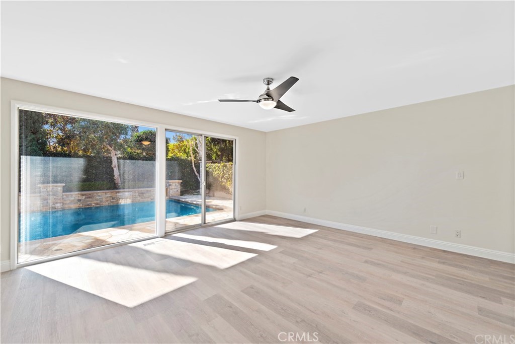 147 Monarch Bay Drive Dana Point, CA 92629 - Photo 12 of 23 a view of a livingroom with a ceiling fan and window