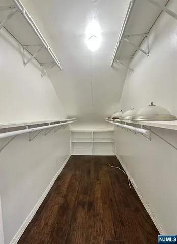 a view of a room with racks on the wall