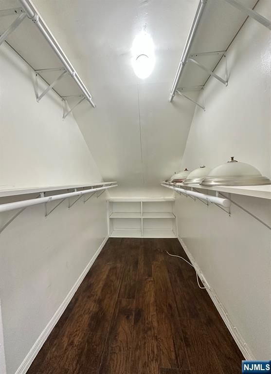 23 Trimble Avenue, Unit 2 Clifton, NJ 07011 - Photo 11 of 16 a view of a room with racks on the wall