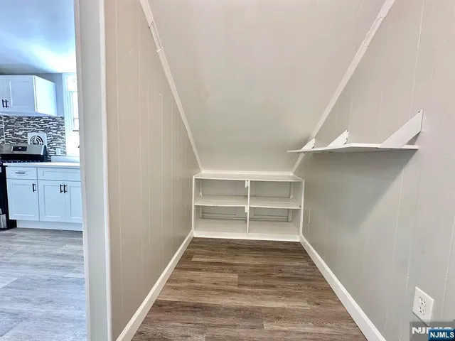 a view of an empty walk in closet