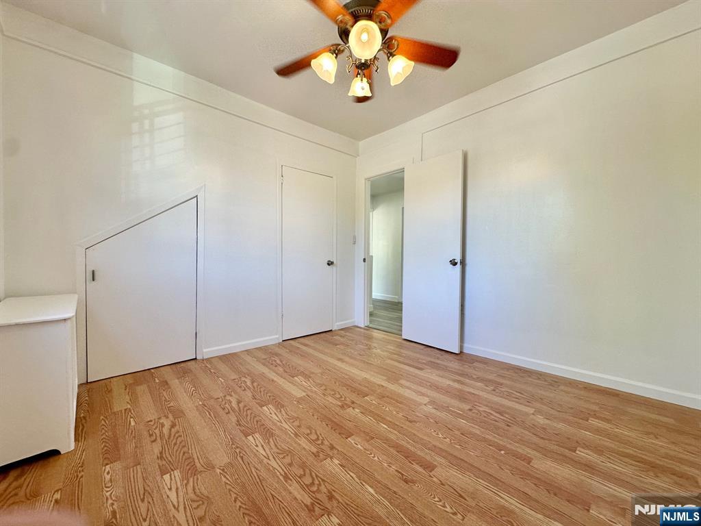 23 Trimble Avenue, Unit 2 Clifton, NJ 07011 - Photo 7 of 16 a view of an empty room with a window