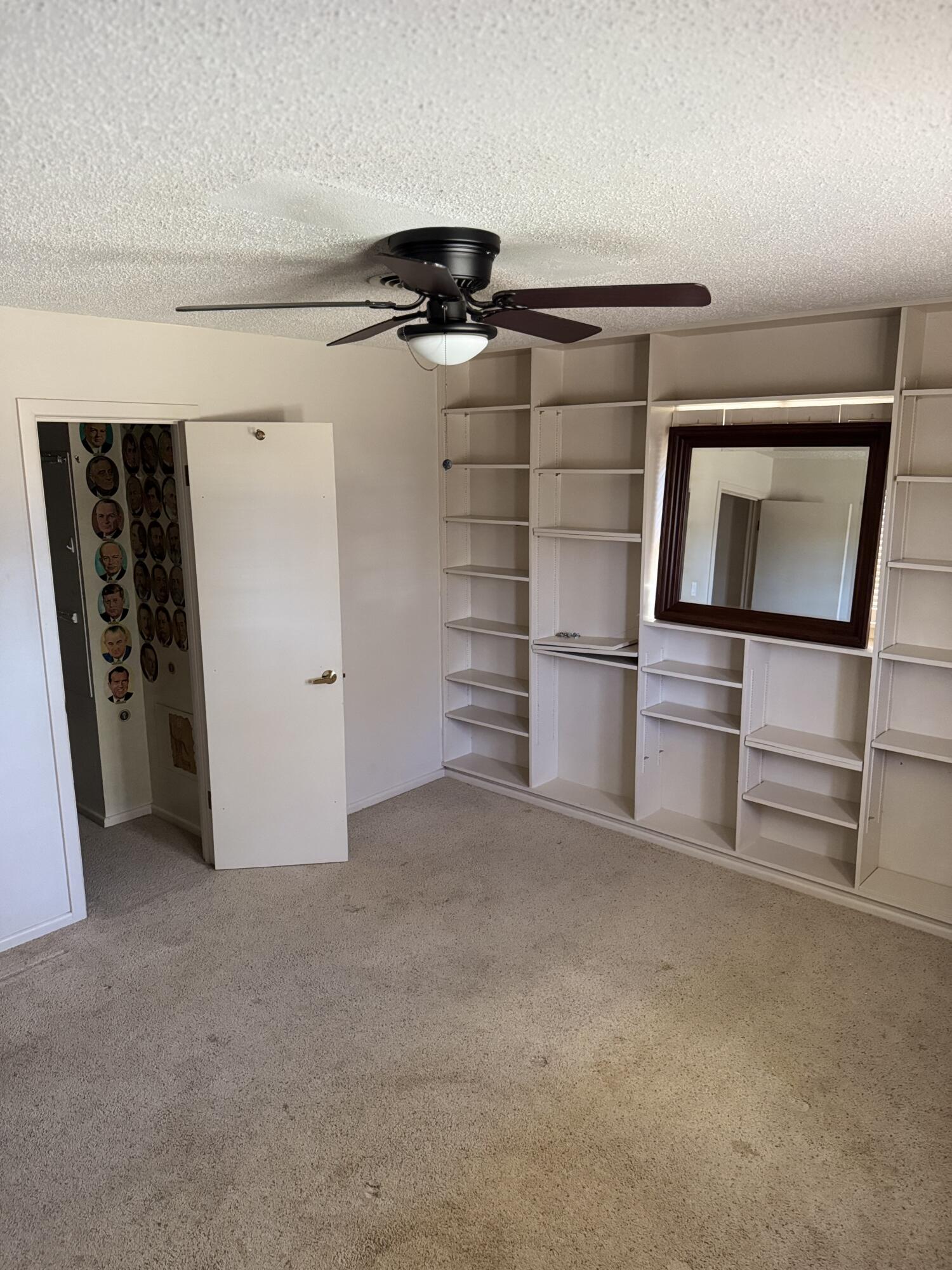 2115 62nd Street Lubbock, TX 79412 - Photo 9 of 15 a view of empty room with refrigerator and stove