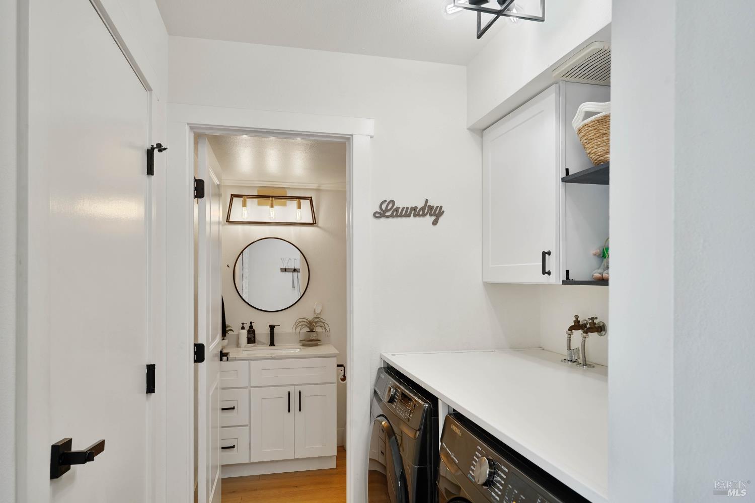 451 37th Street Richmond, CA 94805 - Photo 13 of 36 a view of cabinets with wooden floor