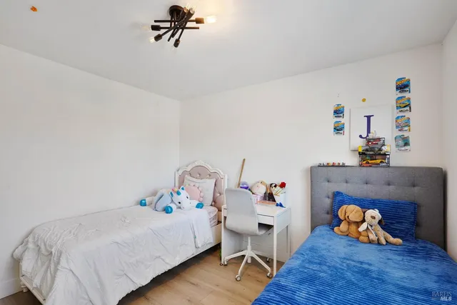 a room with furniture and a wooden floor