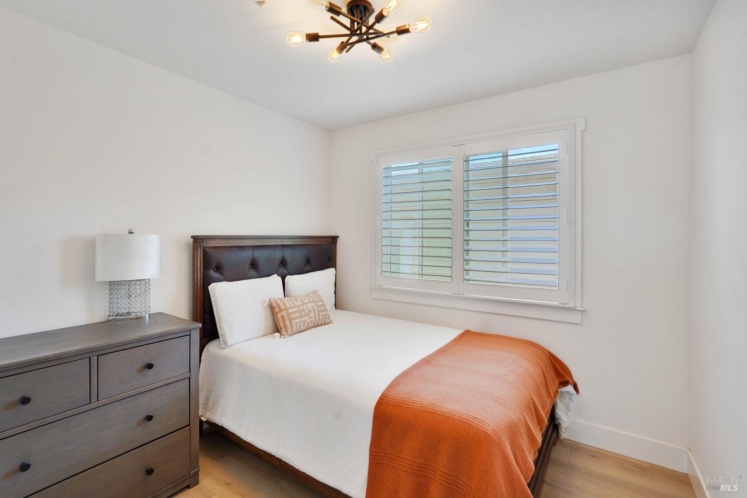 451 37th Street Richmond, CA 94805 - Photo 22 of 36 a bedroom with a bed and window