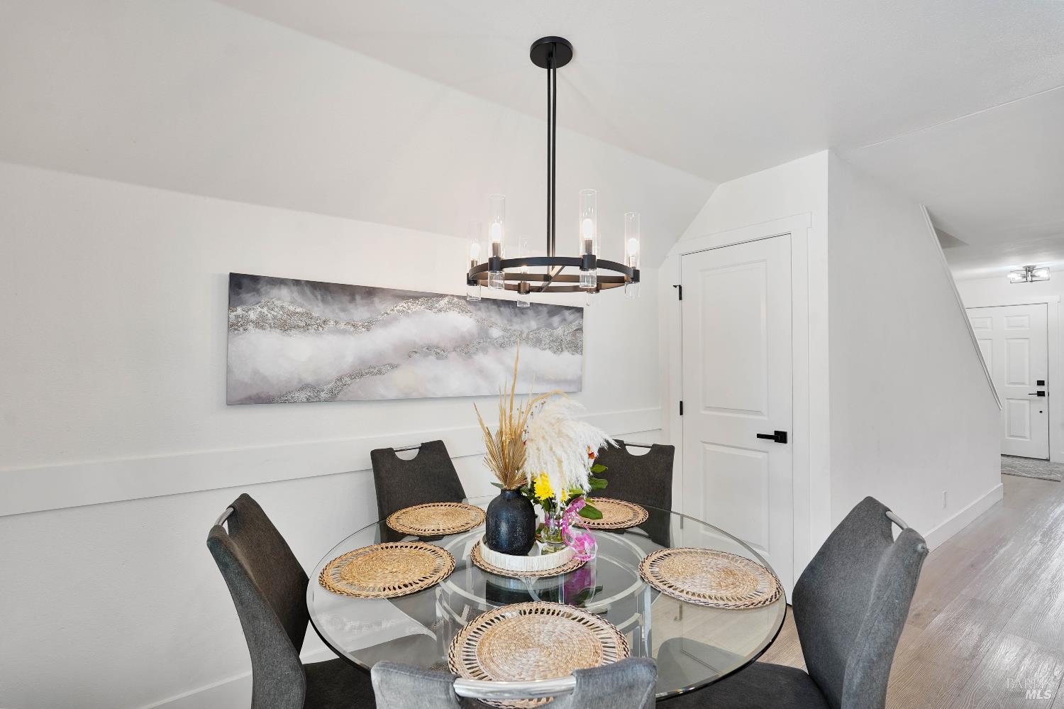 451 37th Street Richmond, CA 94805 - Photo 9 of 36 a view of a dining room with furniture wooden floor and chandelier