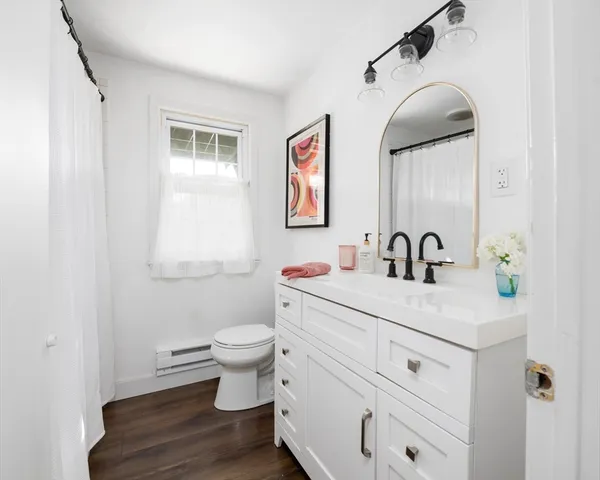 a kitchen with stainless steel appliances granite countertop a refrigerator a stove a sink and a microwave