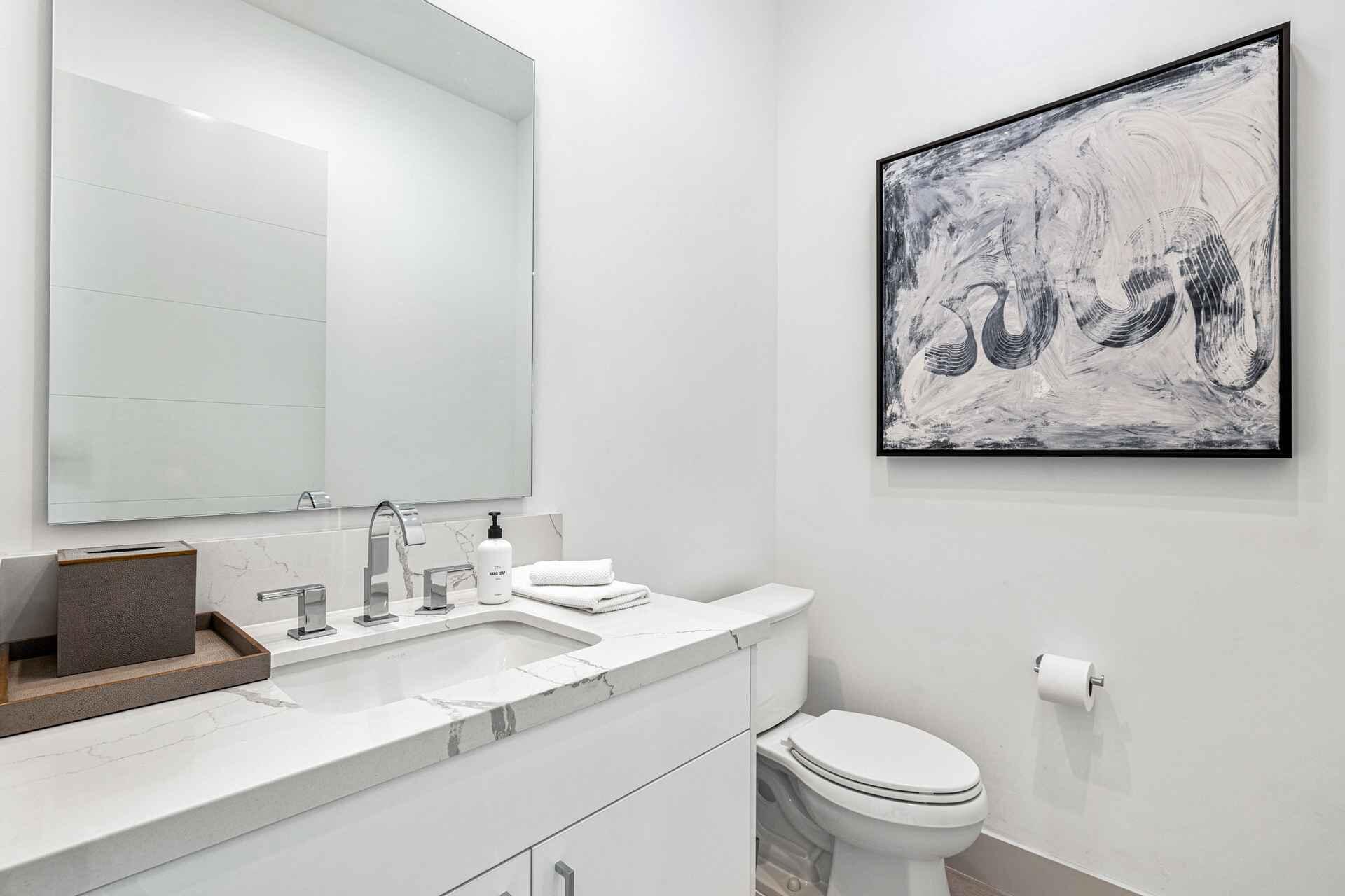 72985 Somera Road Palm Desert, CA 92260 - Photo 12 of 17 a bathroom with a sink mirror vanity and toilet