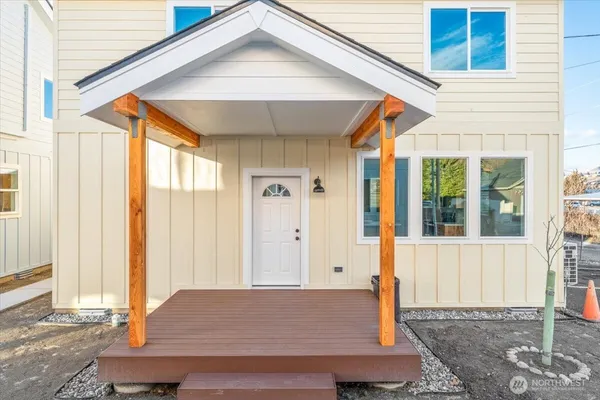 a front view of a house with a porch