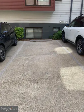 a view of a car parked in garage