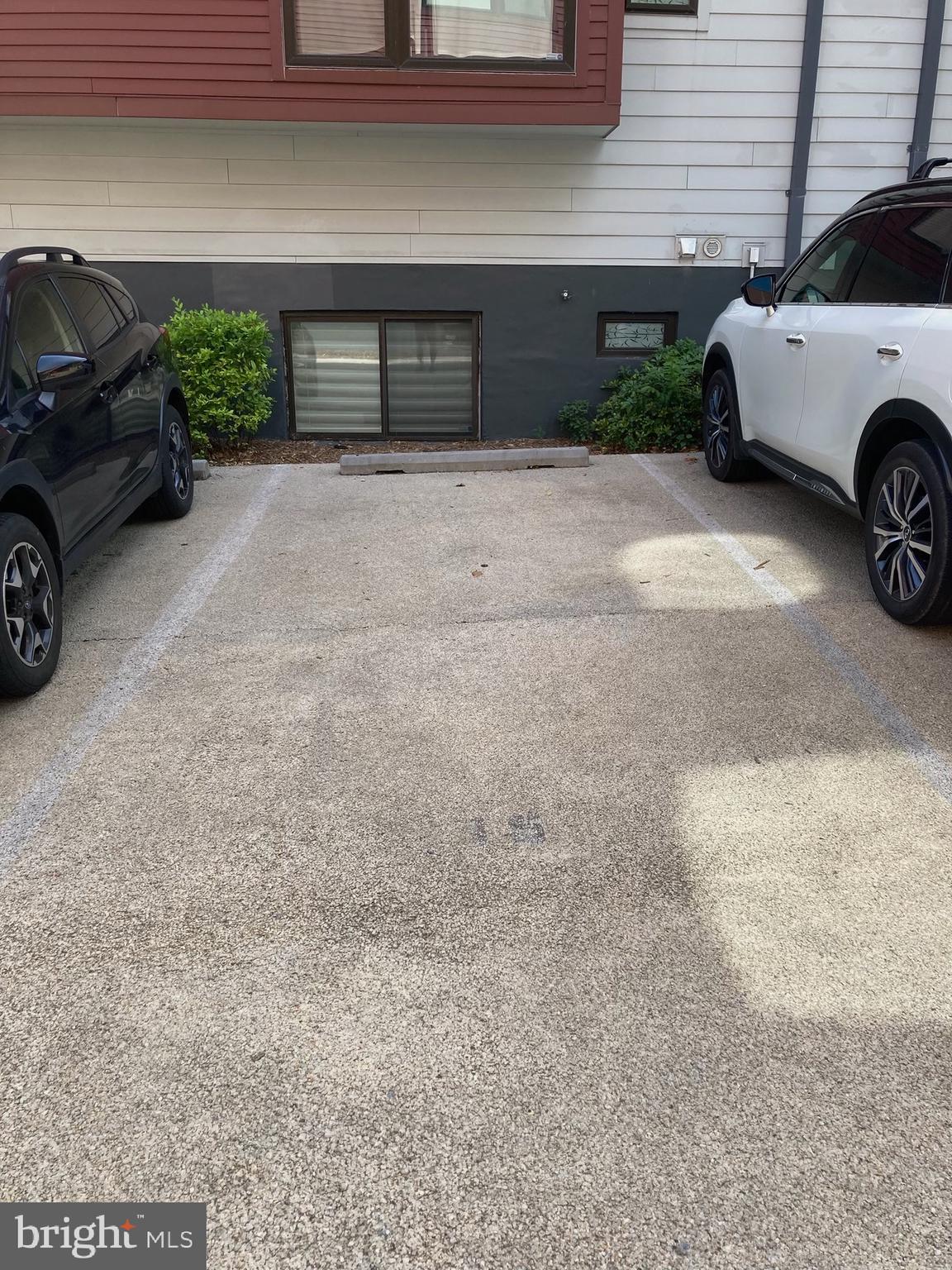1202 Jackson Street Northeast, Unit P15 Washington, DC 20017 - Photo 1 of 1 a view of a car parked in garage
