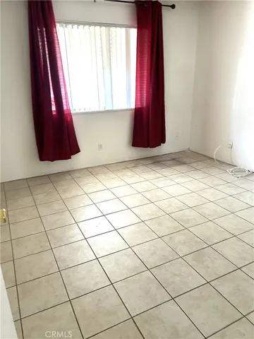 a view of a window with wooden floor