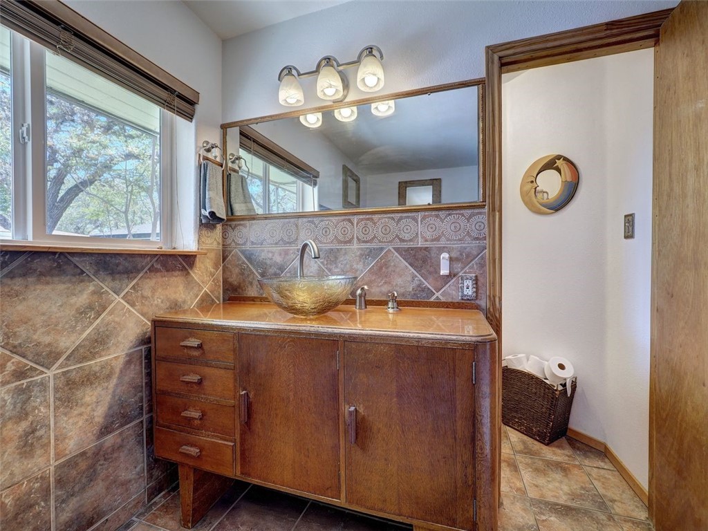 202 Sunset Ingleside, TX 78362 - Photo 14 of 40 a view of a room with wooden floor and cabinet