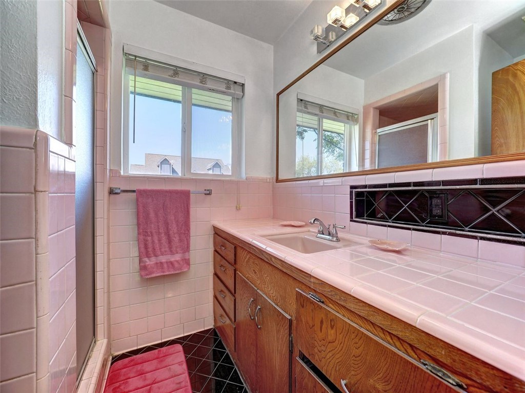 202 Sunset Ingleside, TX 78362 - Photo 18 of 40 a kitchen with a sink and a window
