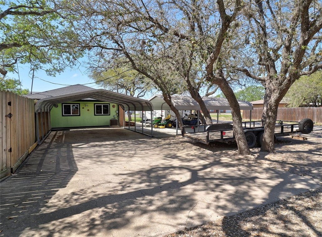 202 Sunset Ingleside, TX 78362 - Photo 36 of 40 a view of a large trees in front of a house