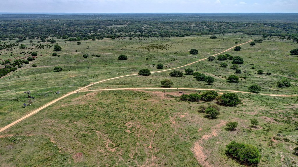 820 Bobby Shelton Ranch Road Northwest Mountain Home, TX 78058 - Photo 2 of 85 a view of a field with an ocean