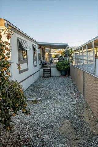 a view of a living room and balcony