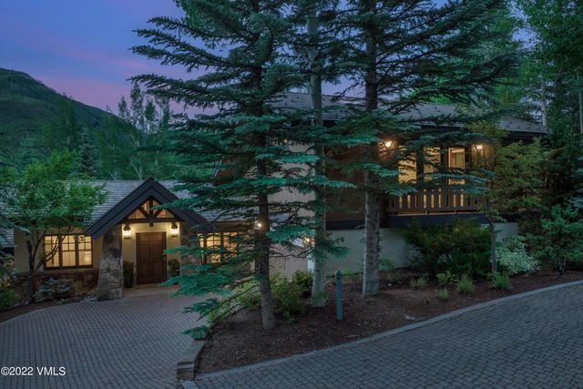 a house view with a garden