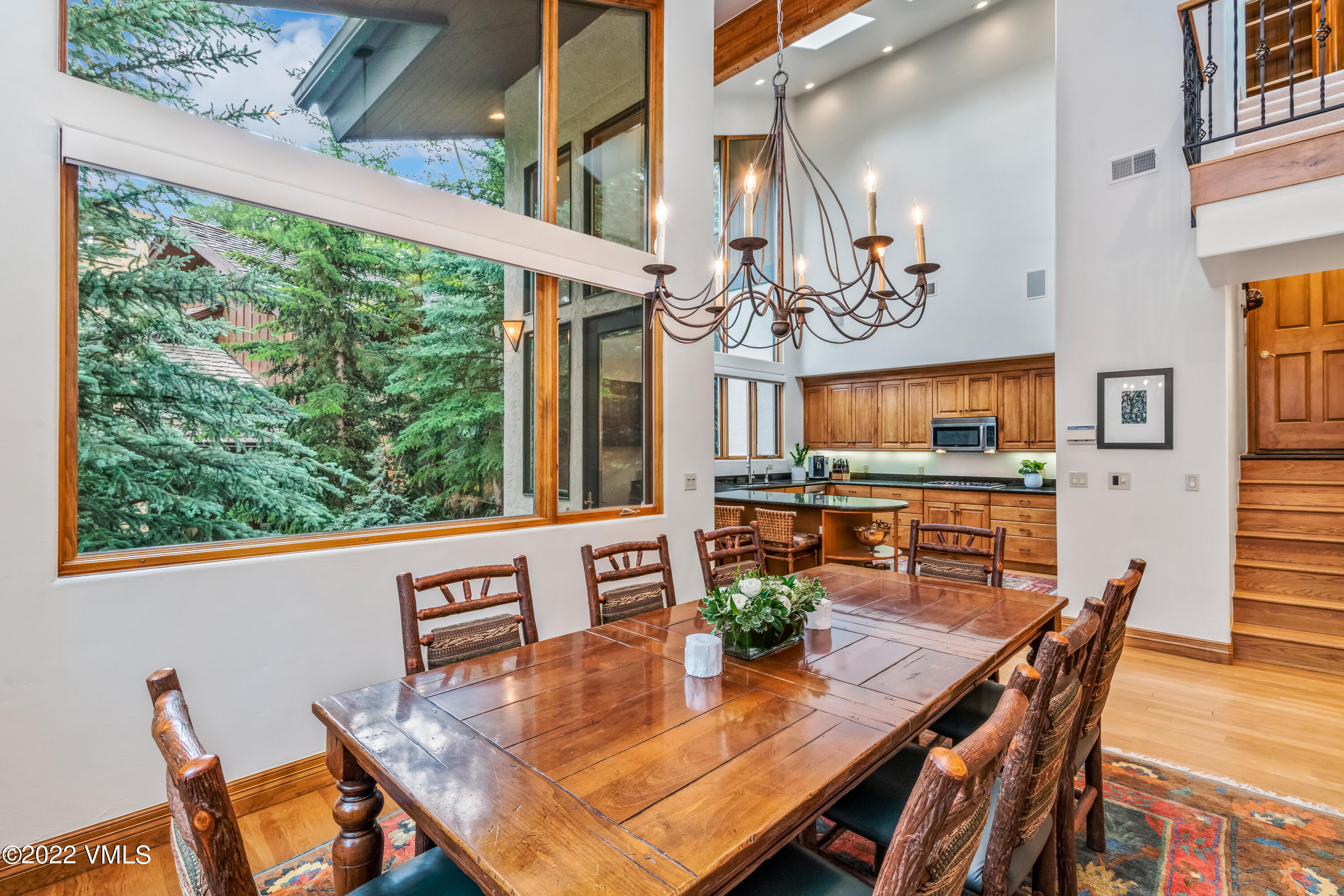 355 Forest Road, Unit B Vail, CO 81657 - Photo 12 of 36 a living room with furniture and a large window