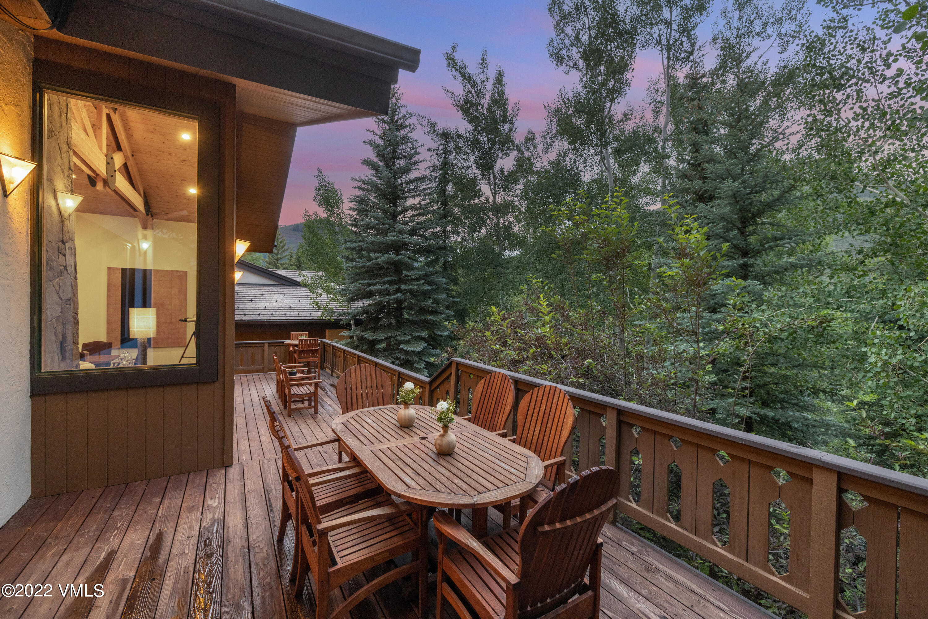 355 Forest Road, Unit B Vail, CO 81657 - Photo 19 of 36 a view of balcony and deck with wooden floor and outdoor seating