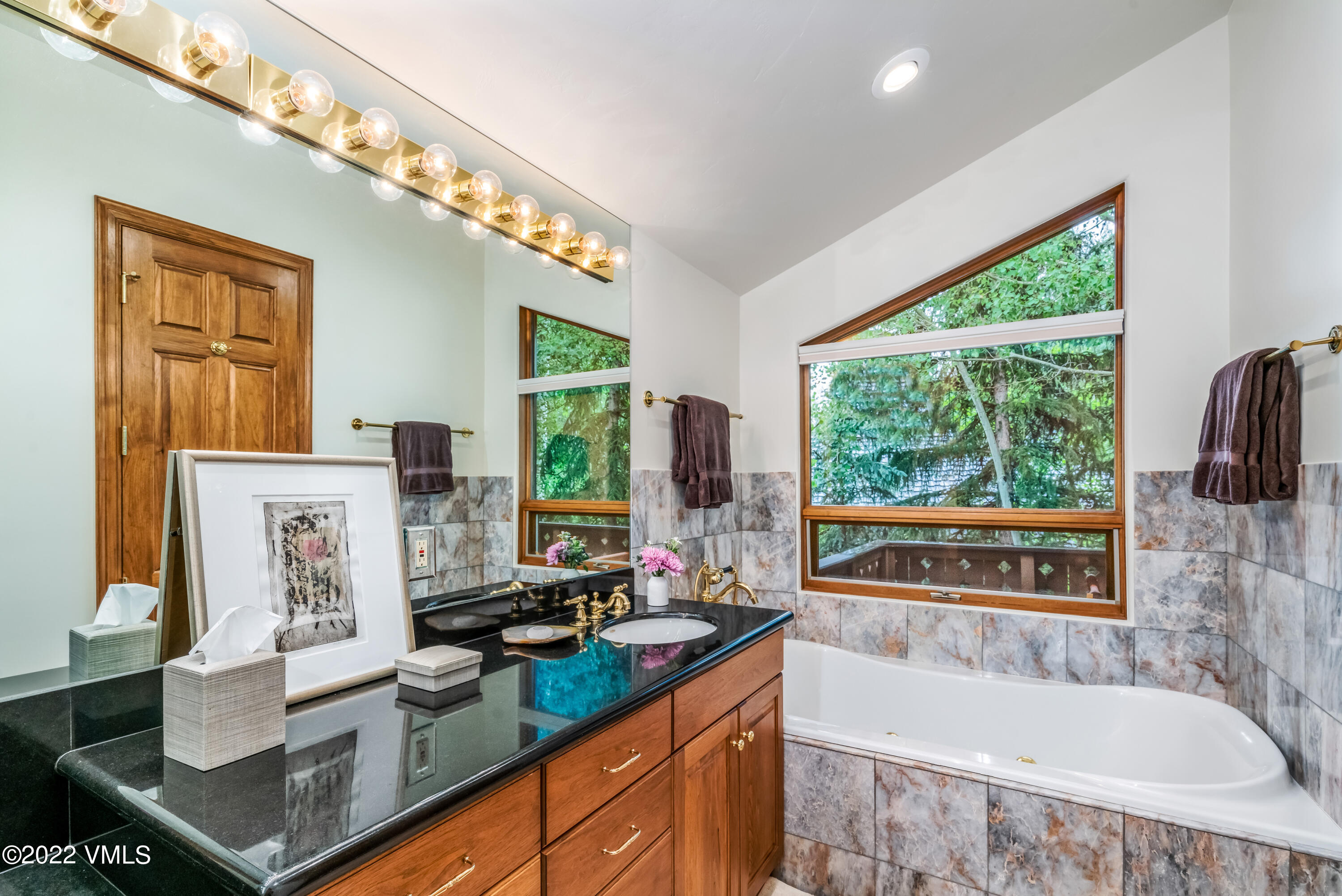 355 Forest Road, Unit B Vail, CO 81657 - Photo 22 of 36 a very nice looking room with a large window