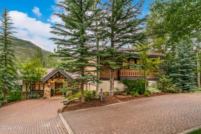 a street sign on a pole on a street