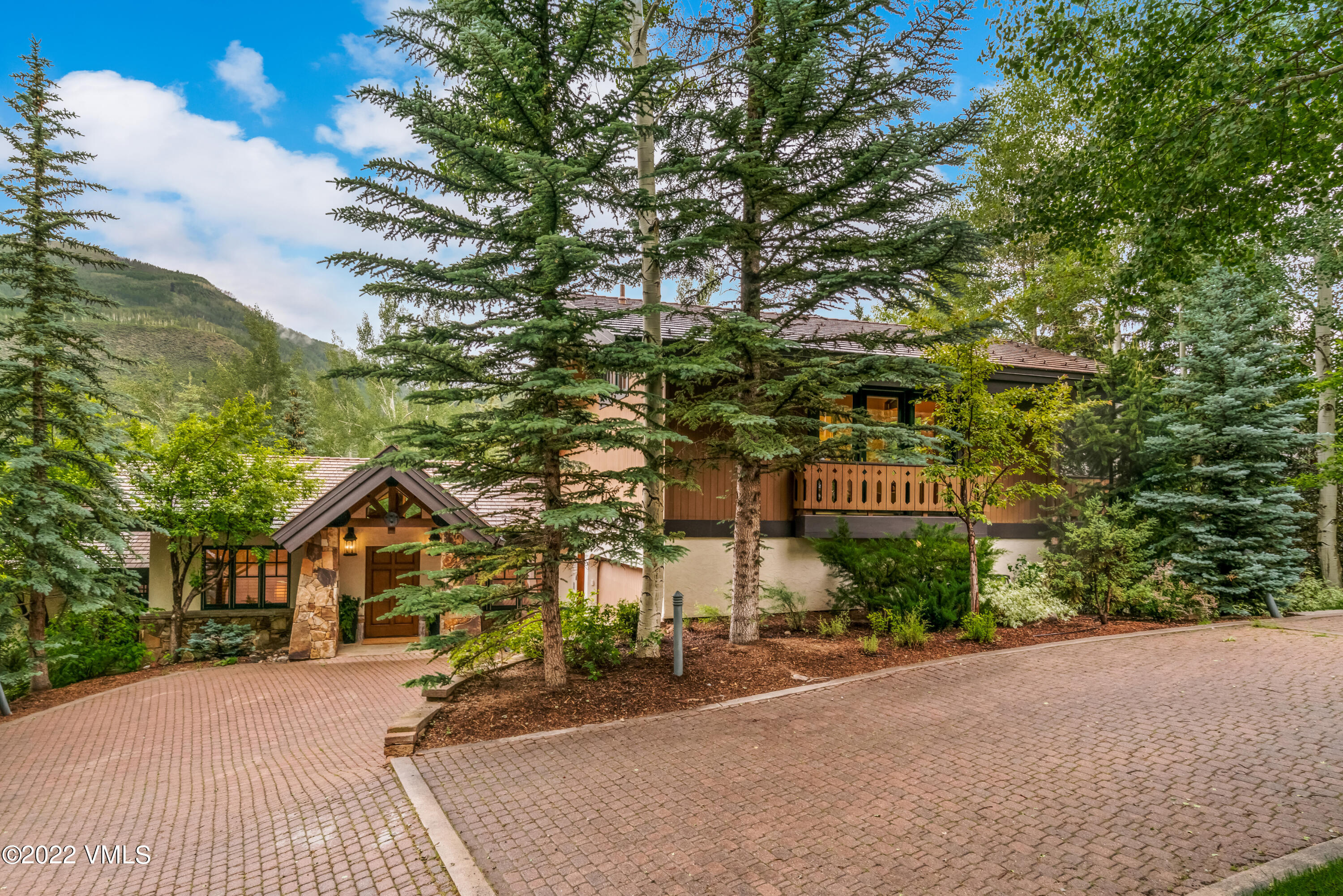 355 Forest Road, Unit B Vail, CO 81657 - Photo 33 of 36 a street sign on a pole on a street