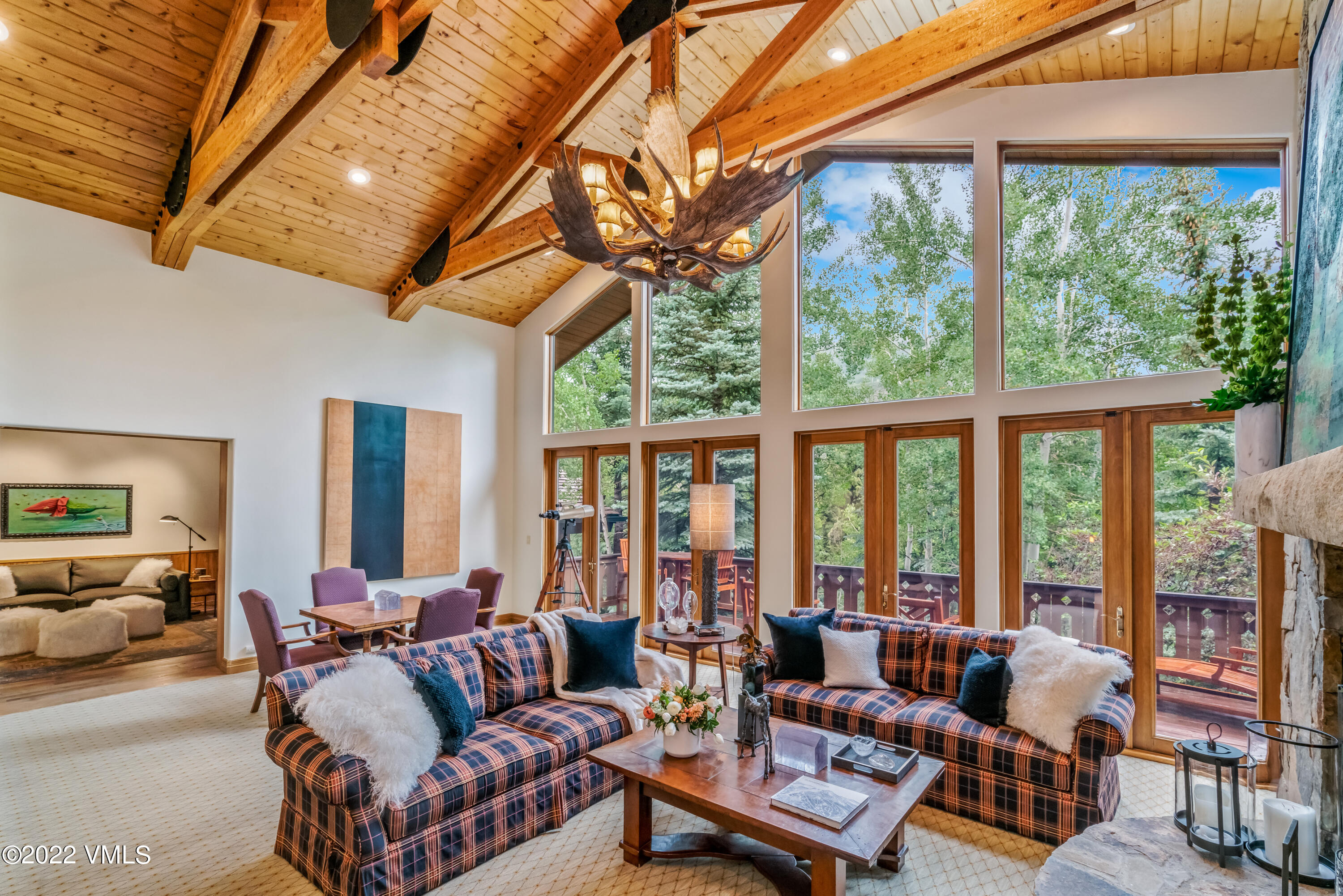 355 Forest Road, Unit B Vail, CO 81657 - Photo 6 of 36 a living room with furniture and a large window