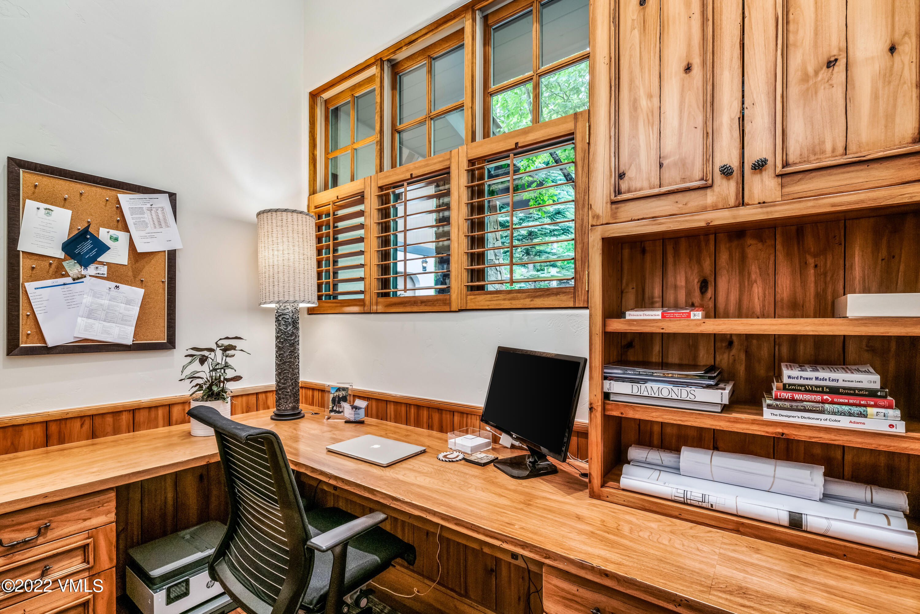 355 Forest Road, Unit B Vail, CO 81657 - Photo 8 of 36 a view of a workspace with furniture and a window