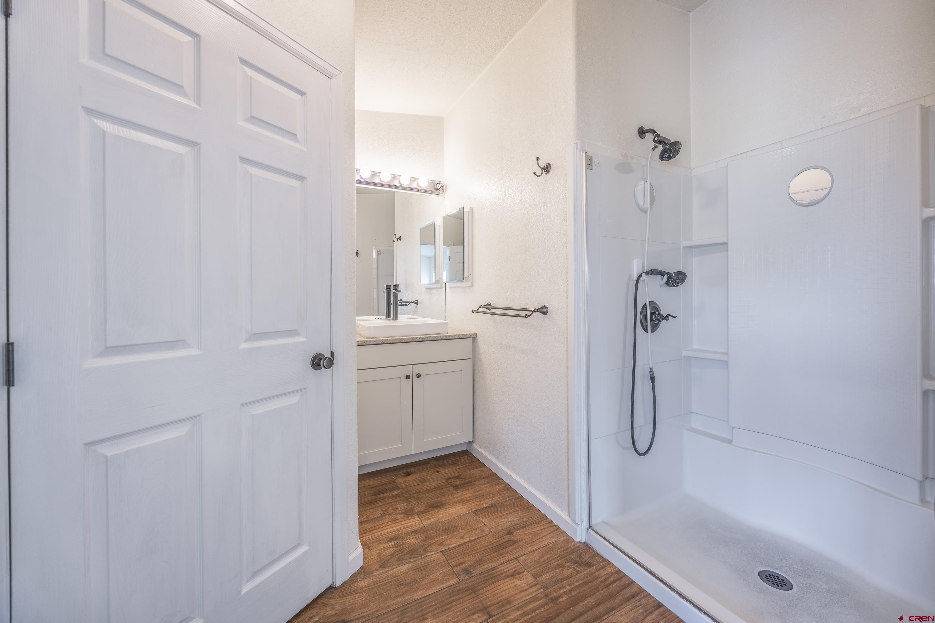 17377 Breeze Road Delta, CO 81416 - Photo 18 of 45 a bathroom with a shower