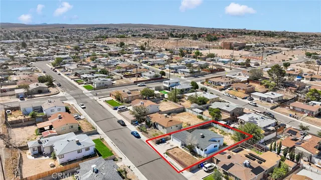 a bathroom with a granite countertop shower and a sink
