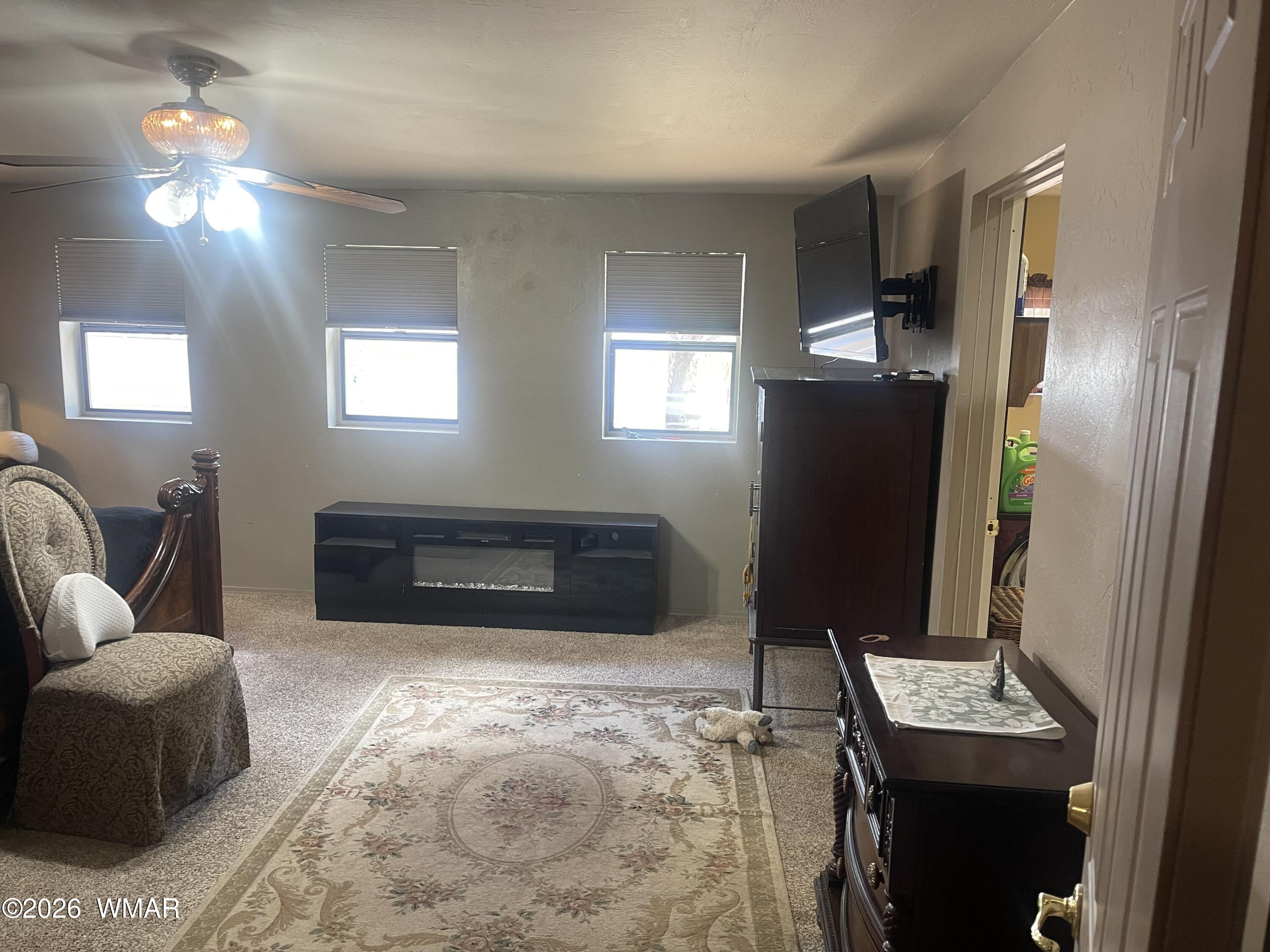 2871 Moose Trail Overgaard, AZ 85933 - Photo 14 of 25 a living room with furniture and a flat screen tv