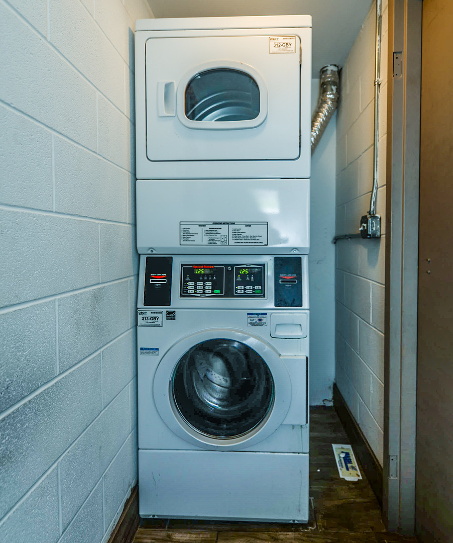 2234 South Goebbert Road, Unit 320 Arlington Heights, IL 60005 - Photo 25 of 37 a utility room with dryer and washer
