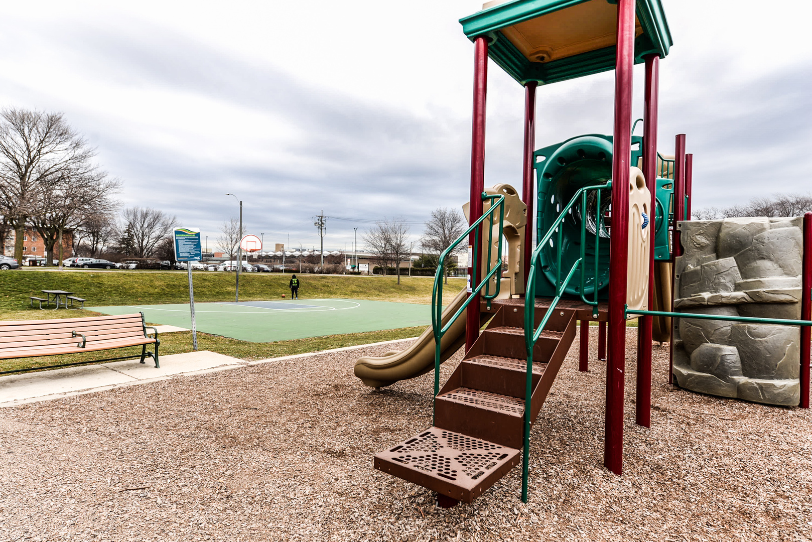 2234 South Goebbert Road, Unit 320 Arlington Heights, IL 60005 - Photo 31 of 37 a park with lots of swings and slides