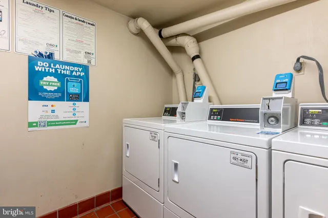 a view of a balcony with furniture