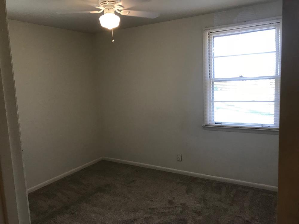 703 Olympia Place Murfreesboro, TN 37130 - Photo 13 of 13 an empty room with a window