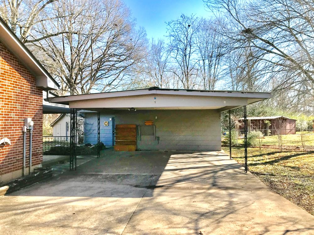 703 Olympia Place Murfreesboro, TN 37130 - Photo 2 of 13 a front view of a house with a yard and garage