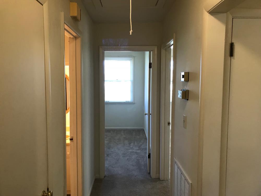 703 Olympia Place Murfreesboro, TN 37130 - Photo 10 of 13 a view of a bathroom from a hallway
