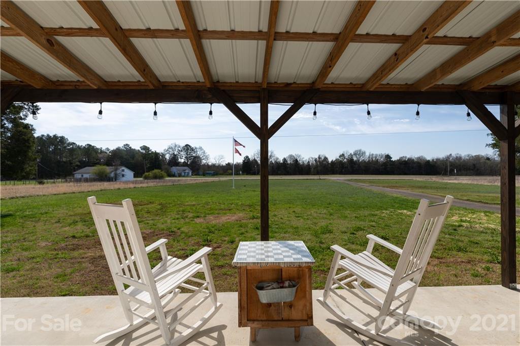 854 West Rambo Road Rock Hill, SC 29730 - Photo 9 of 27 a patio with water view fountain and a table